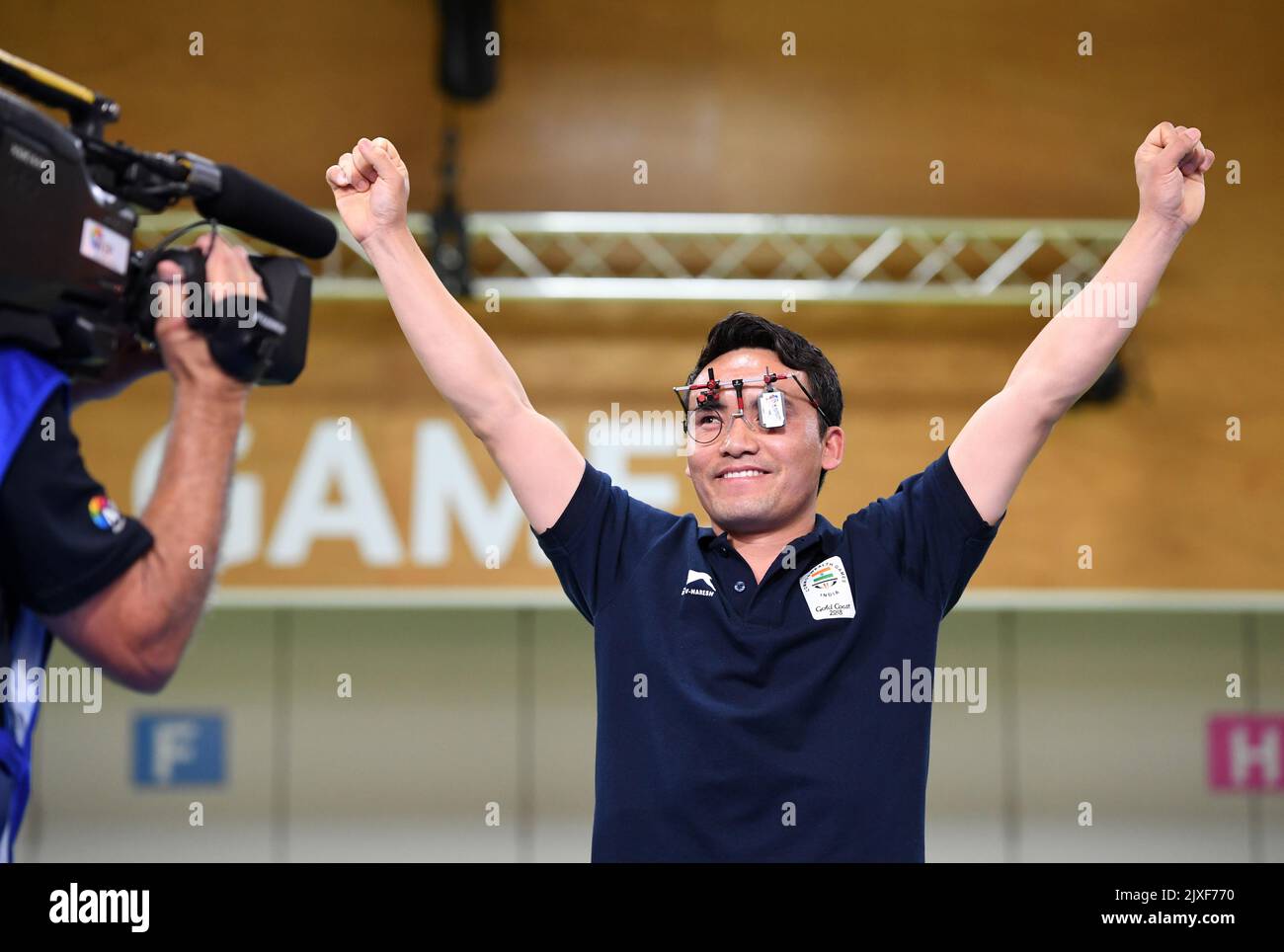 Jitu Rai of India celebrates taking the gold in the men's 10m air ...