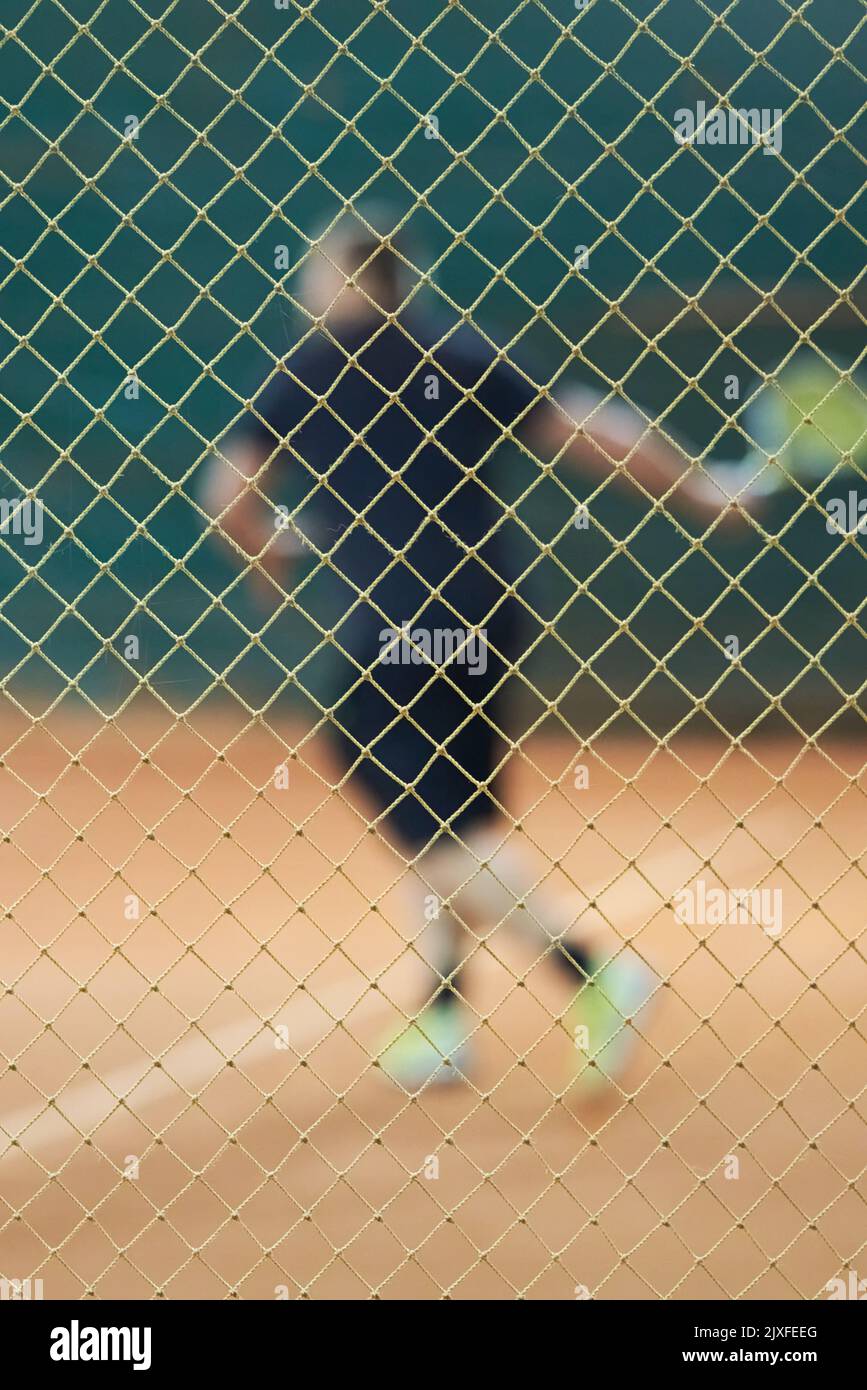 Man who playing padel tennis with space for text. Caucasian player