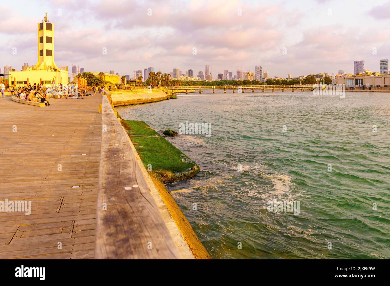 Tel-Aviv, Israel - June 17, 2022: Sunset view of the Reading Lighthouse, with visitors, in Tel-Aviv, Israel Stock Photo