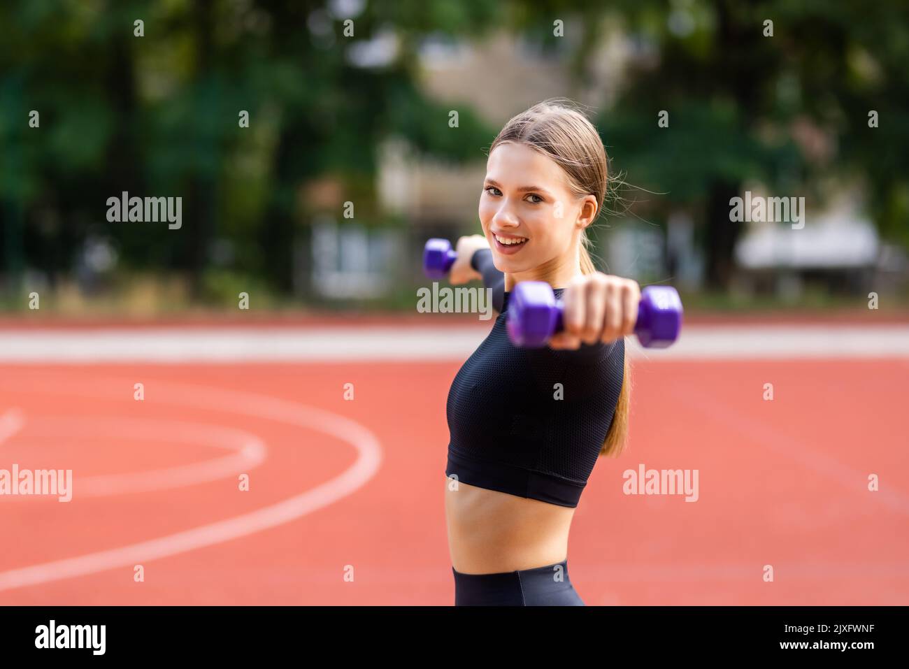 Female athlete stretching on field hi-res stock photography and images -  Alamy