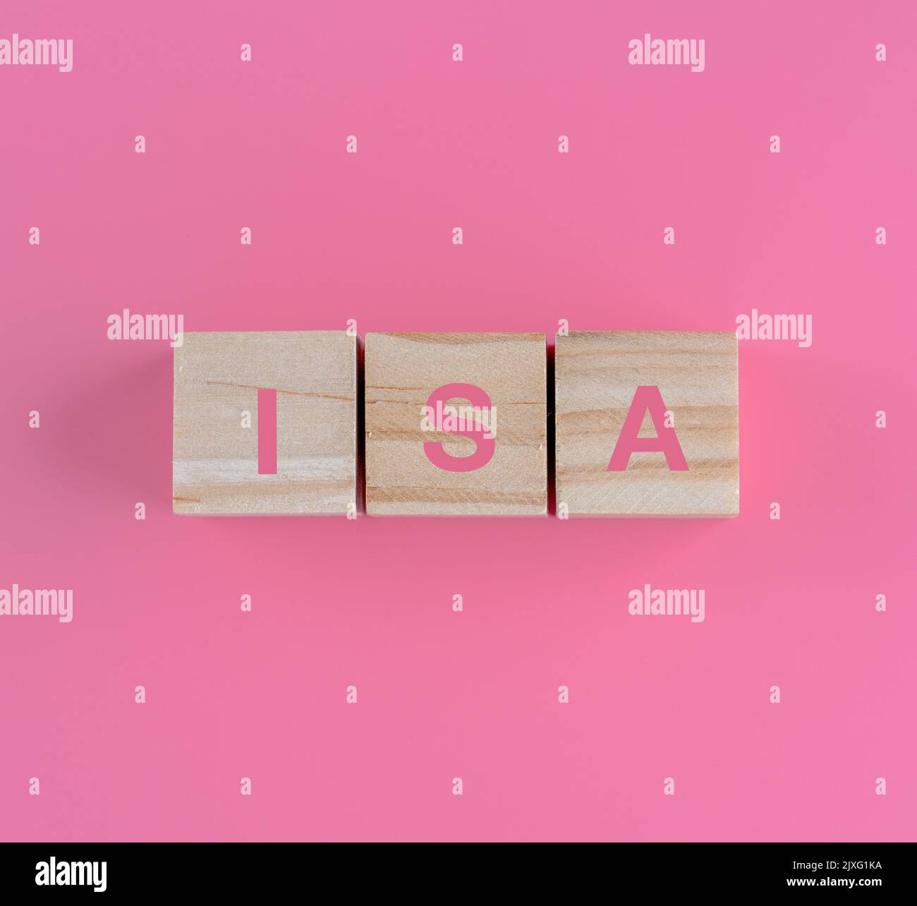 cash or stocks and shares ISA investment concept  building blocks on a pink background Stock Photo