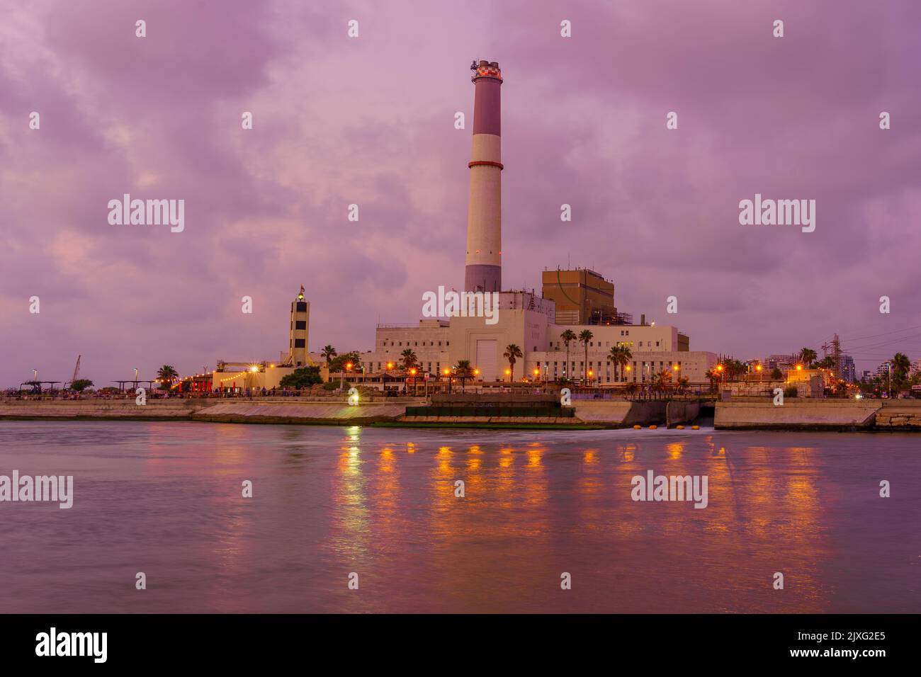Sunset view of the Reading power station and lighthouse, in Tel-Aviv, Israel Stock Photo