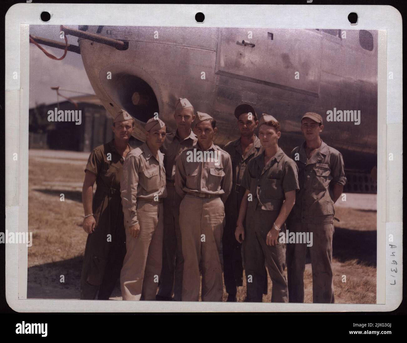 Flight Crew Poses In Front Of A North American B 25 Panama Stock Photo flight-crew-poses-in-front-of-a-north-american-b-25-panama-stock-photo