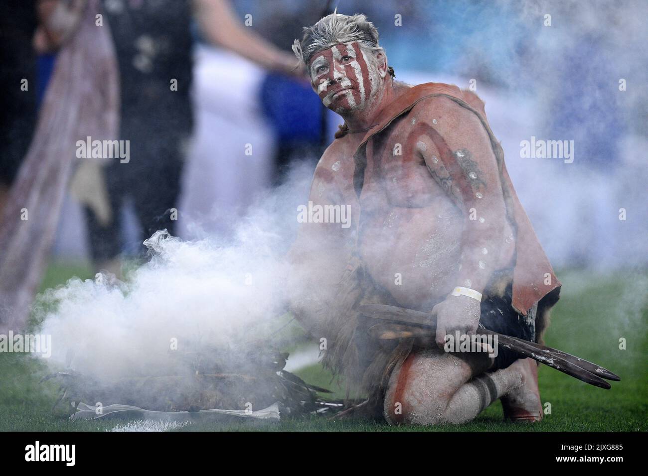Indigenous performers conduct a traditional smoking ceremony ahead of ...