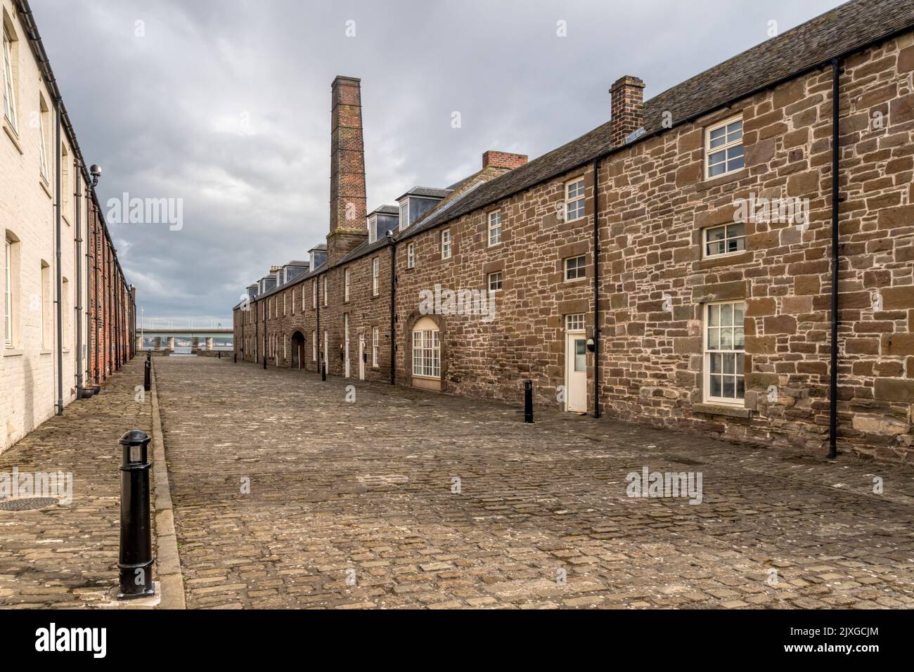 Chandlers Lane, Dundee contains homes converted from the former harbour workshops dating back to 1837. The chimney marks the original blacksmiths. Stock Photo