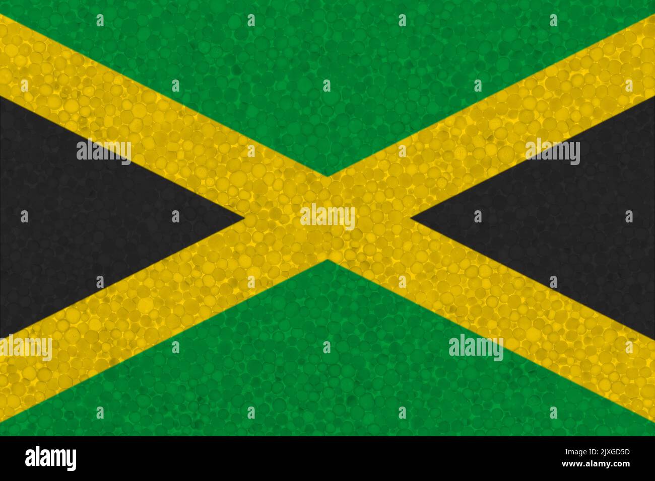 Flag of Jamaica on styrofoam texture. national flag painted on the surface of plastic foam Stock Photo