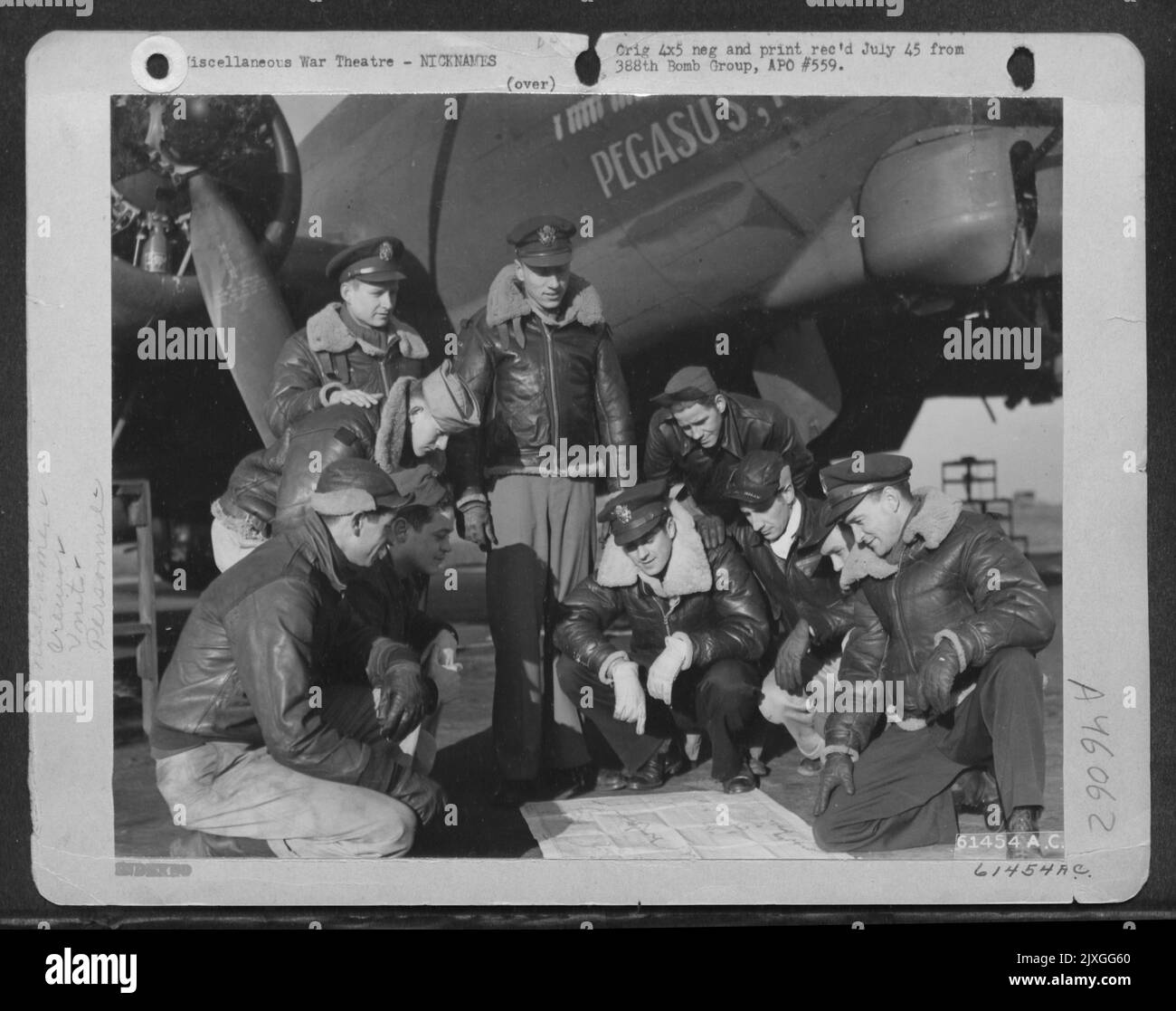 Crew Of The 563Rd Bomb Squadron, 388Th Bomb Group, Beside The Boeing B
