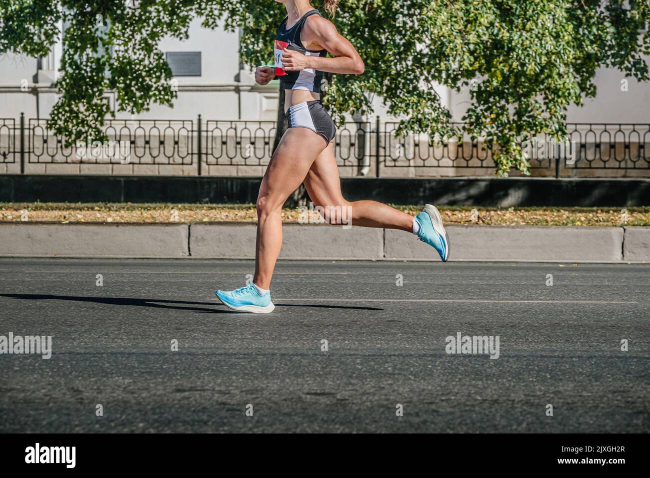 female runner run city marathon race Stock Photo