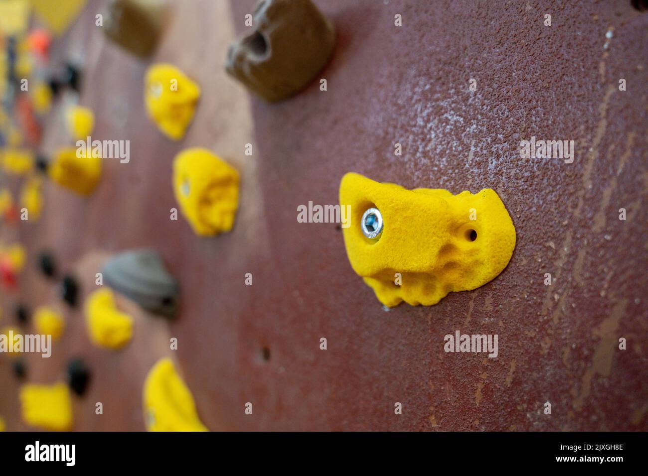 Bouldering climbing grips wall equipment close up Stock Photo Alamy