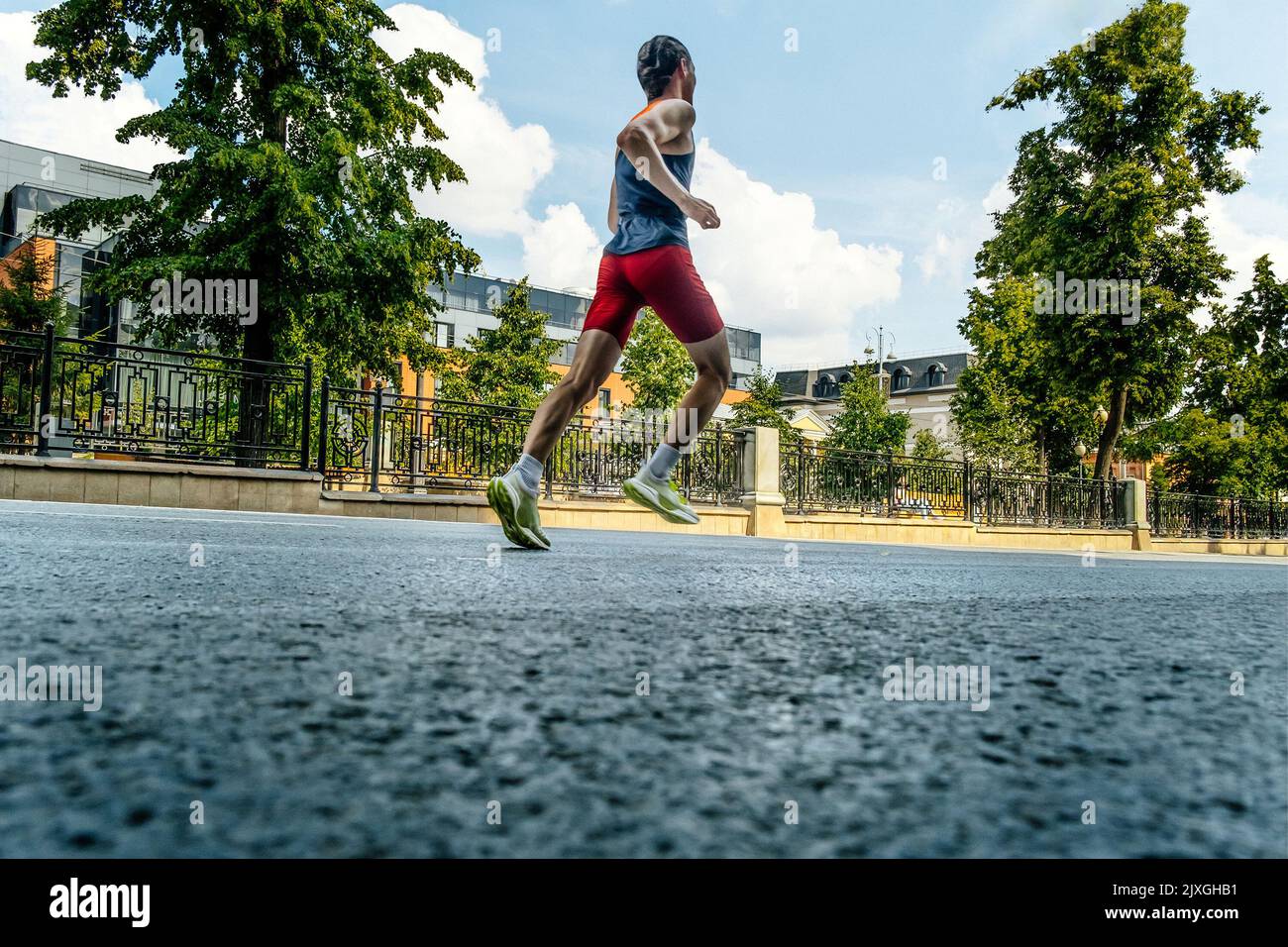 male runner athlete running street marathon Stock Photo