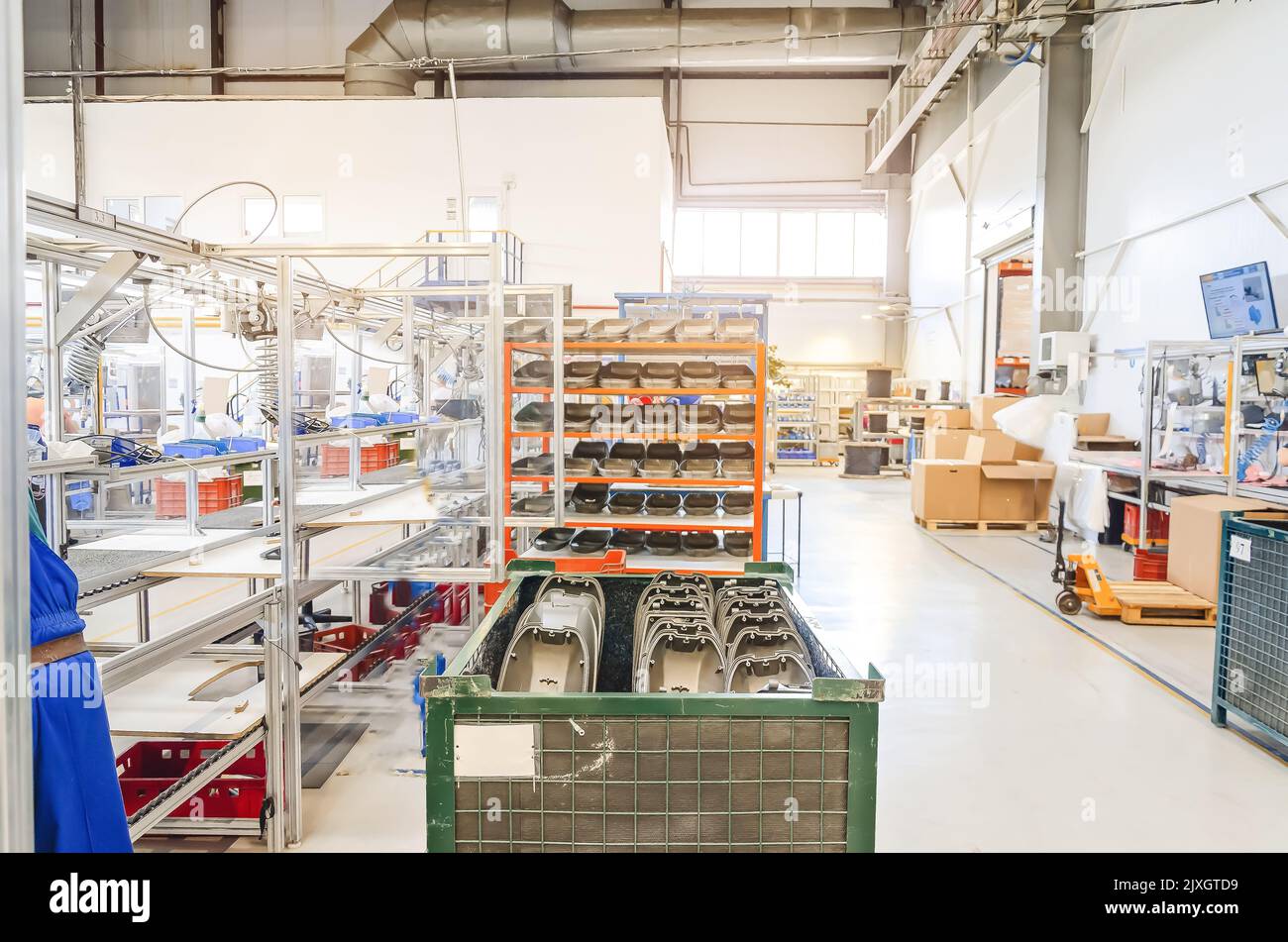 Modern interior of warehouse of finished products. Gray plastic lamps