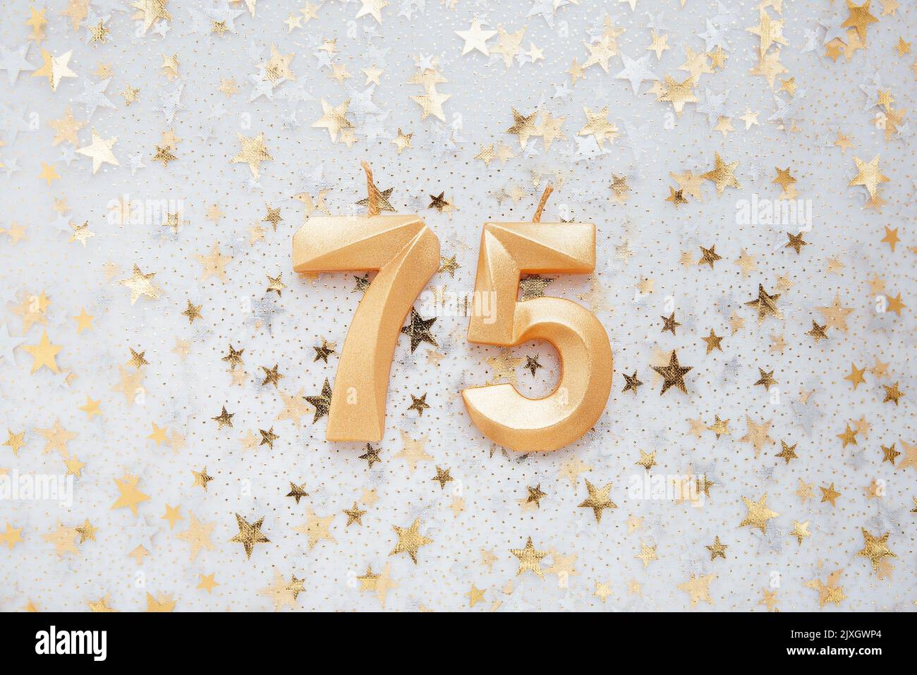 Number 75 seventy five golden celebration birthday candle on Festive Number 75 seventy five golden celebration birthday candle on Festive