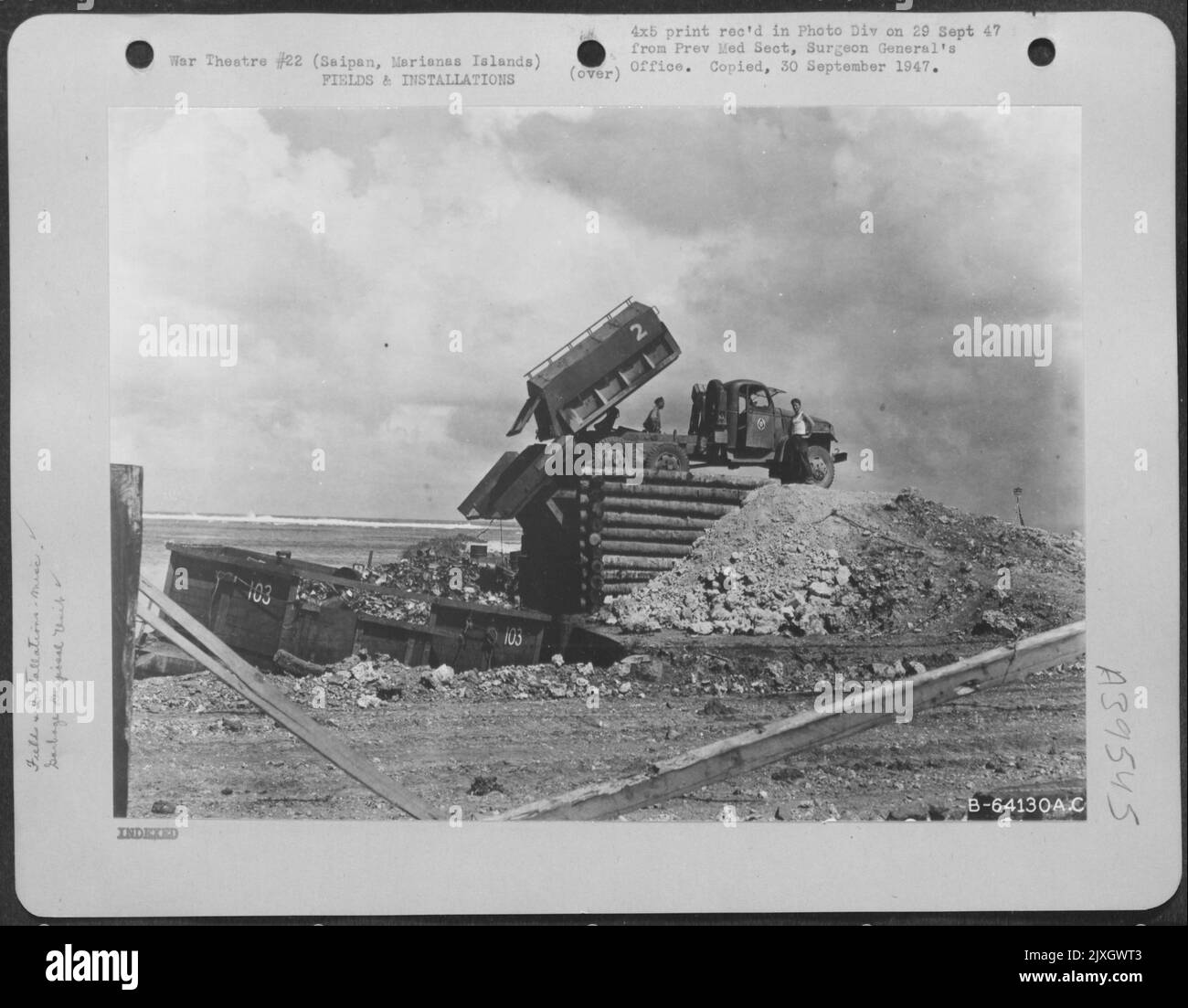 Garbage Barge Which Disposes Of Rubbish At Sea, Saipan, Marianas Islands. Stock Photo