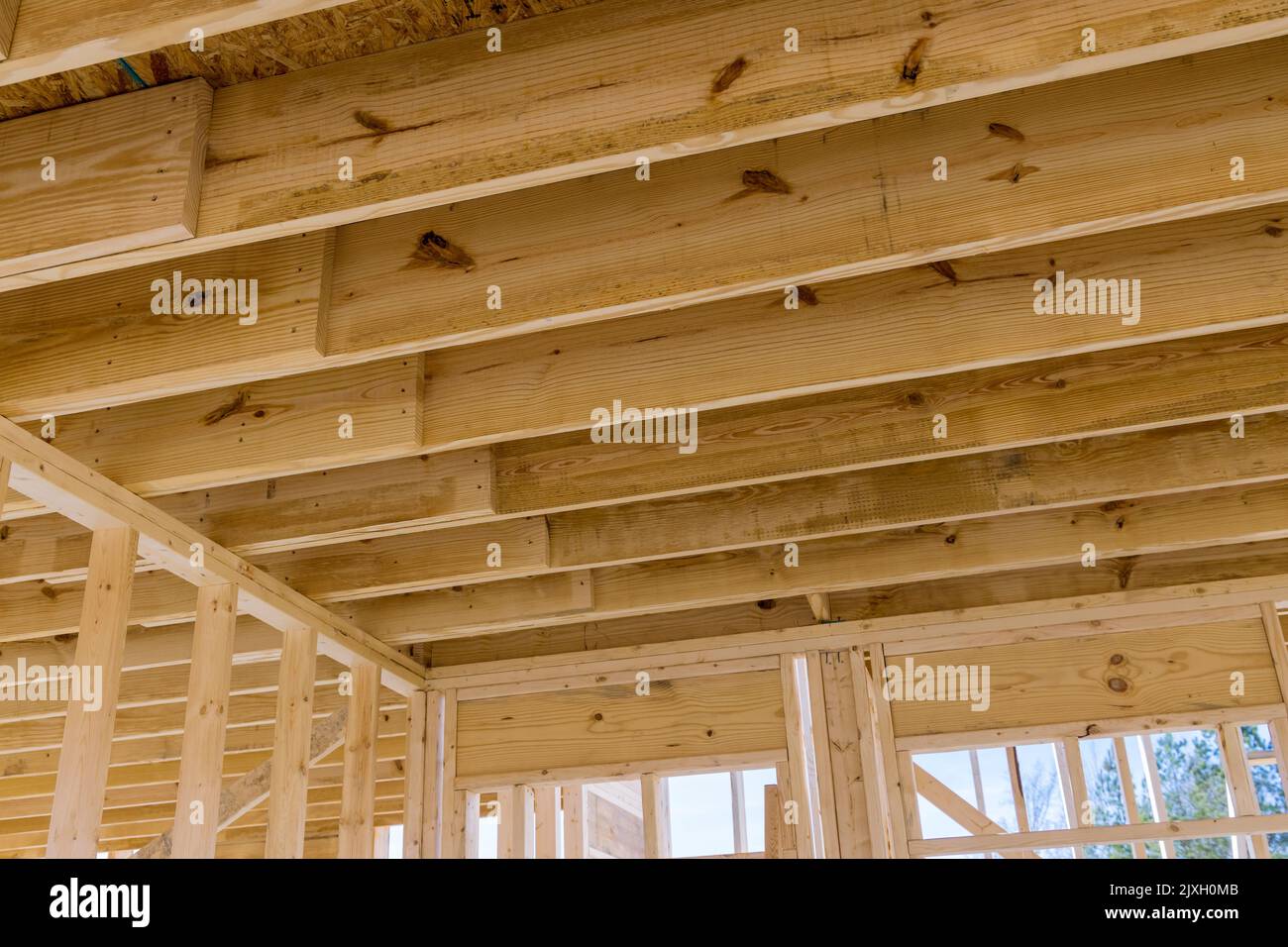 The wooden beams sticks that are being used to build a new house are