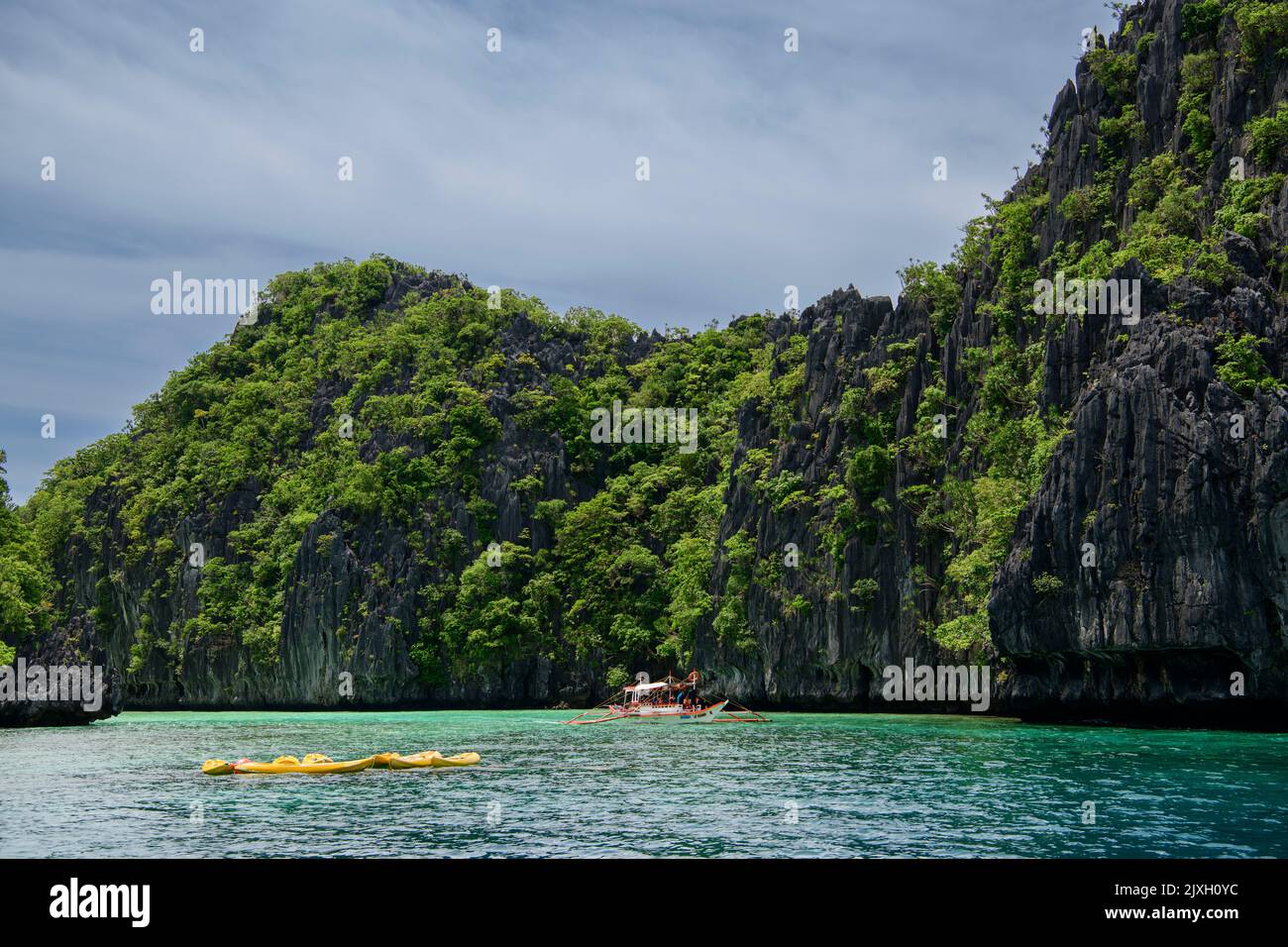 Palawan, Philippines, Tourists Kayaking and Exploring the Natural
