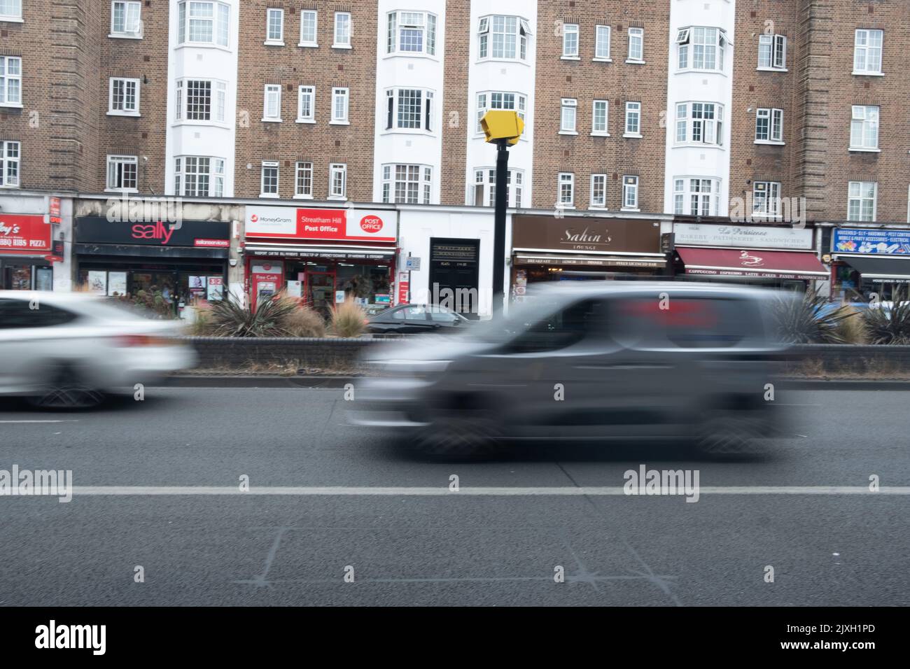 London- August 2022: Speed camera on Streatham High Road, a major high street of mixed retail in south west London Stock Photo