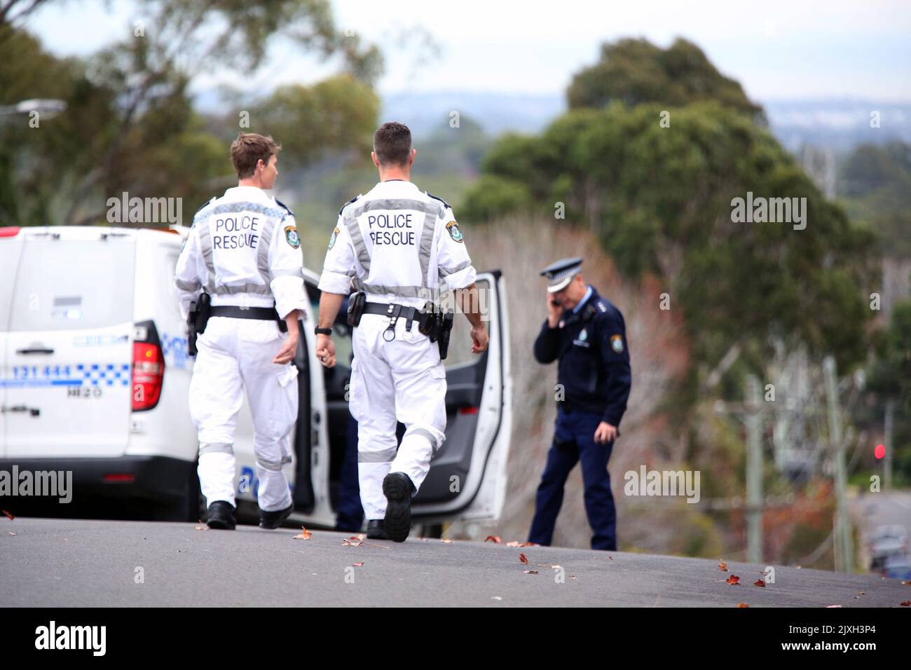 Forensic police work at the scene of a crime in Carlingford, Sydney, Friday, June 8, 2018. A 36