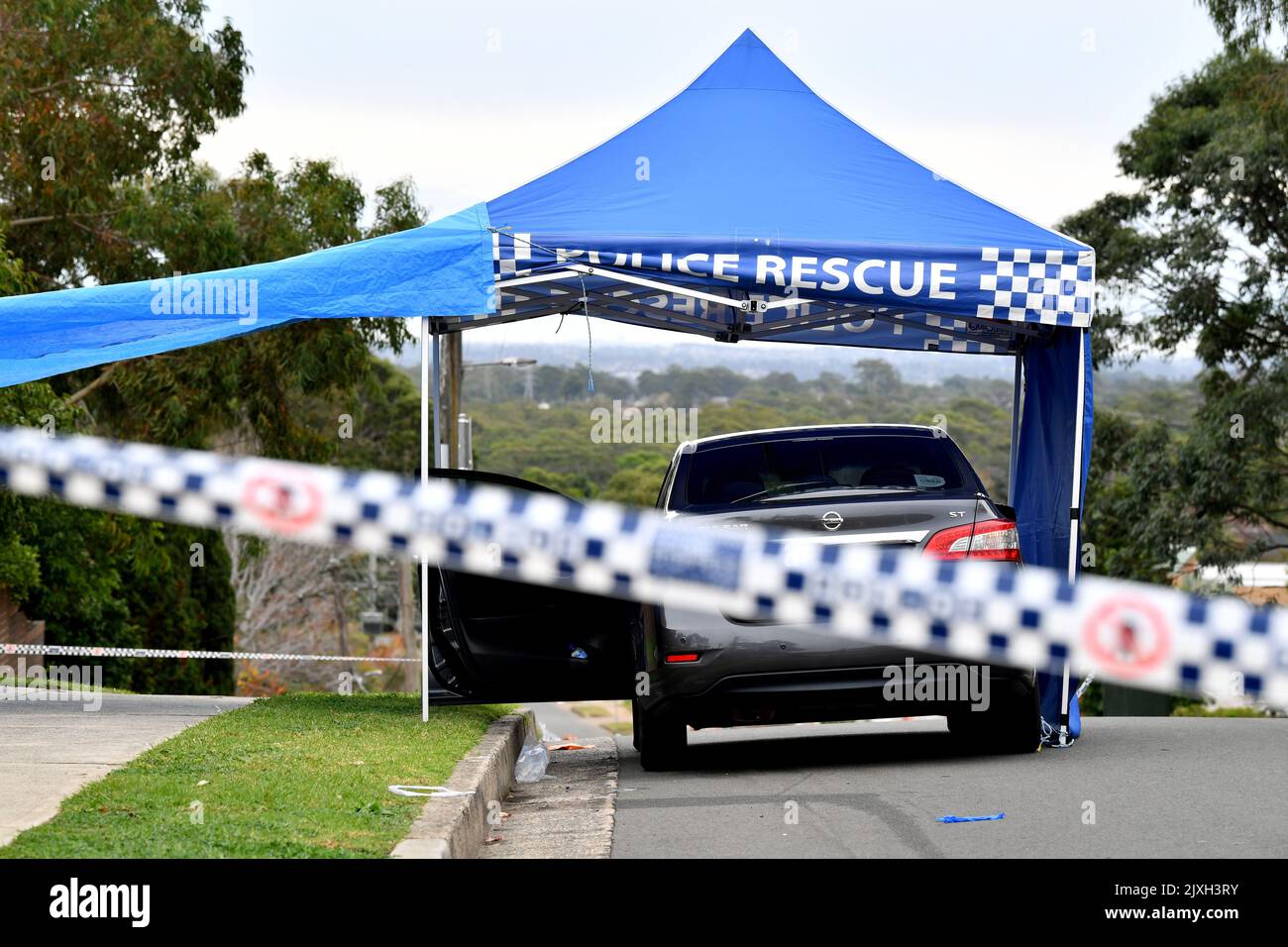 NSW police are seen at a crime scene in Carlingford, Sydney, Friday, June 8, 2018. A 36yearold