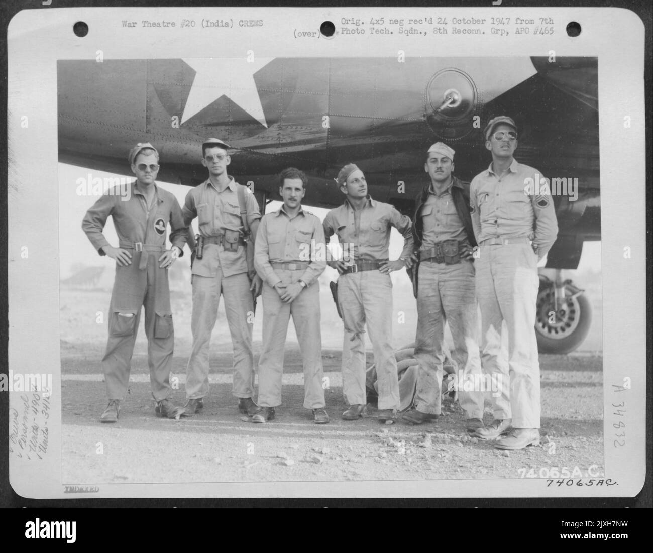 Major J. A. Philpott, Commanding Officer Of The 490Th Bomb Squadron, 341St Bomb Group And Crew Pose Beside Their Plane At Ondal Airfield, India. 15 March 1943. They Are, Left To Right: Major Phipott, Pilot; 1St Lt. Rider, Bombardier; 1St Lt. Zeidler, Bo Stock Photo