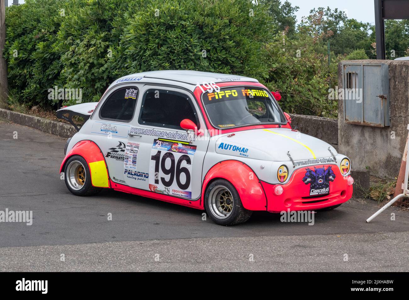 A vintage Fiat 500 minicar competing at the Giarre-Milo hill climb event on Mount Etna, Sicily Stock Photo