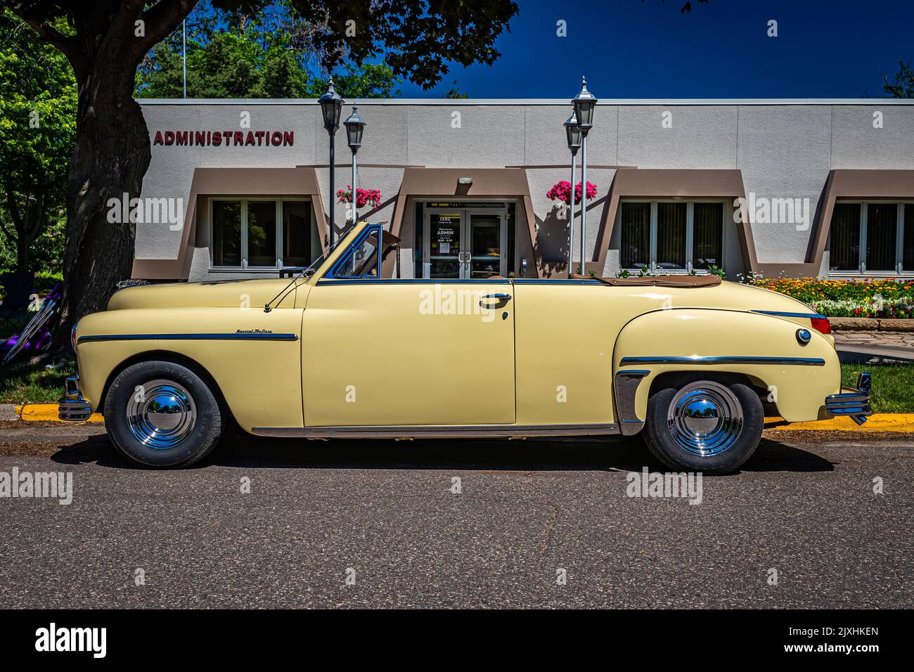 Falcon Heights, MN - June 17, 2022: Low perspective side view of a 1949 Plymouth Special Deluxe Convertible at a local car show. Stock Photo