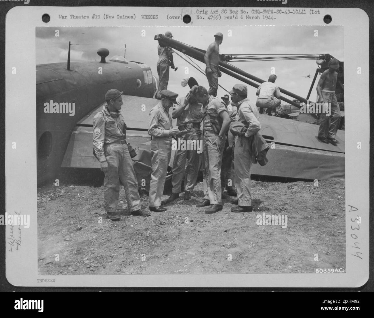 Major General Richard K. Sutherland confers with the crew of a North ...