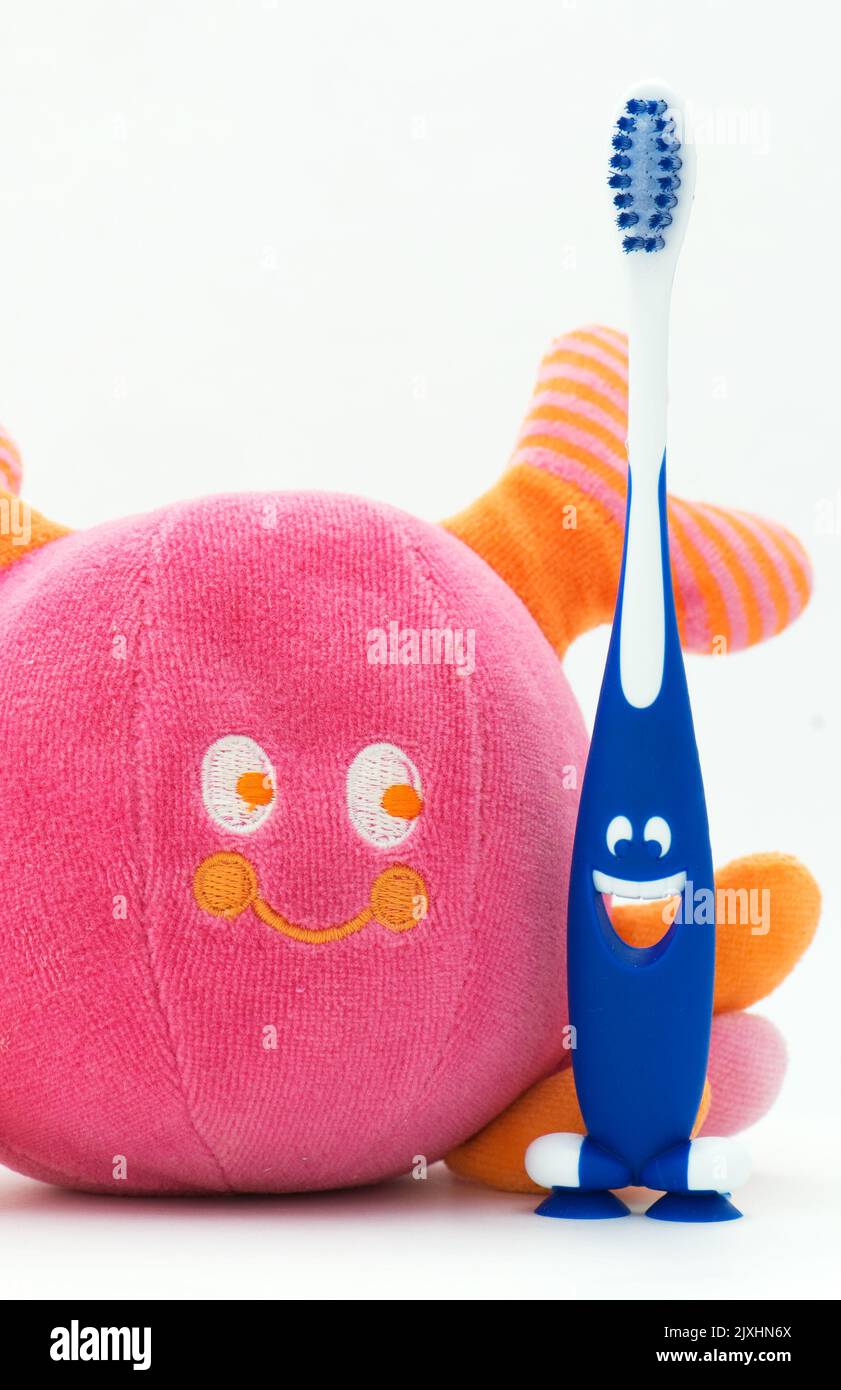 Toothbrush with toy Stock Photo