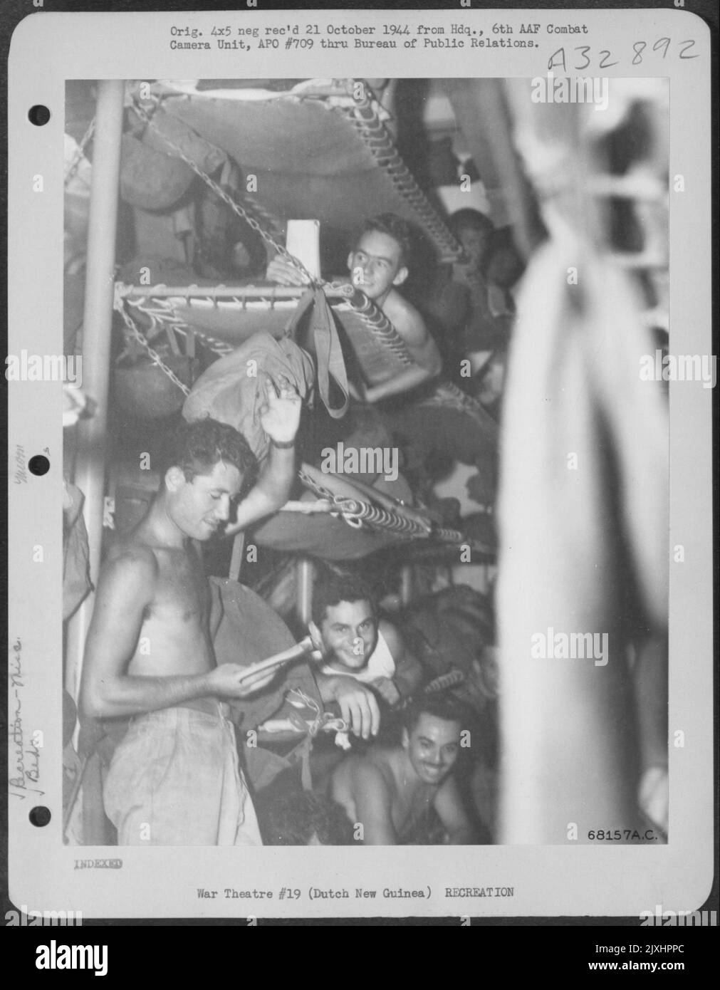 Sleeping quarters were very crowded aboard a wartime Army transport. Bunks are stacked six to