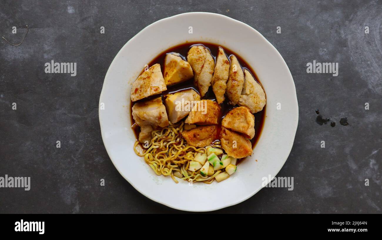 Pempek or empek-empek or fish cake is a food made from soft ground fish ...