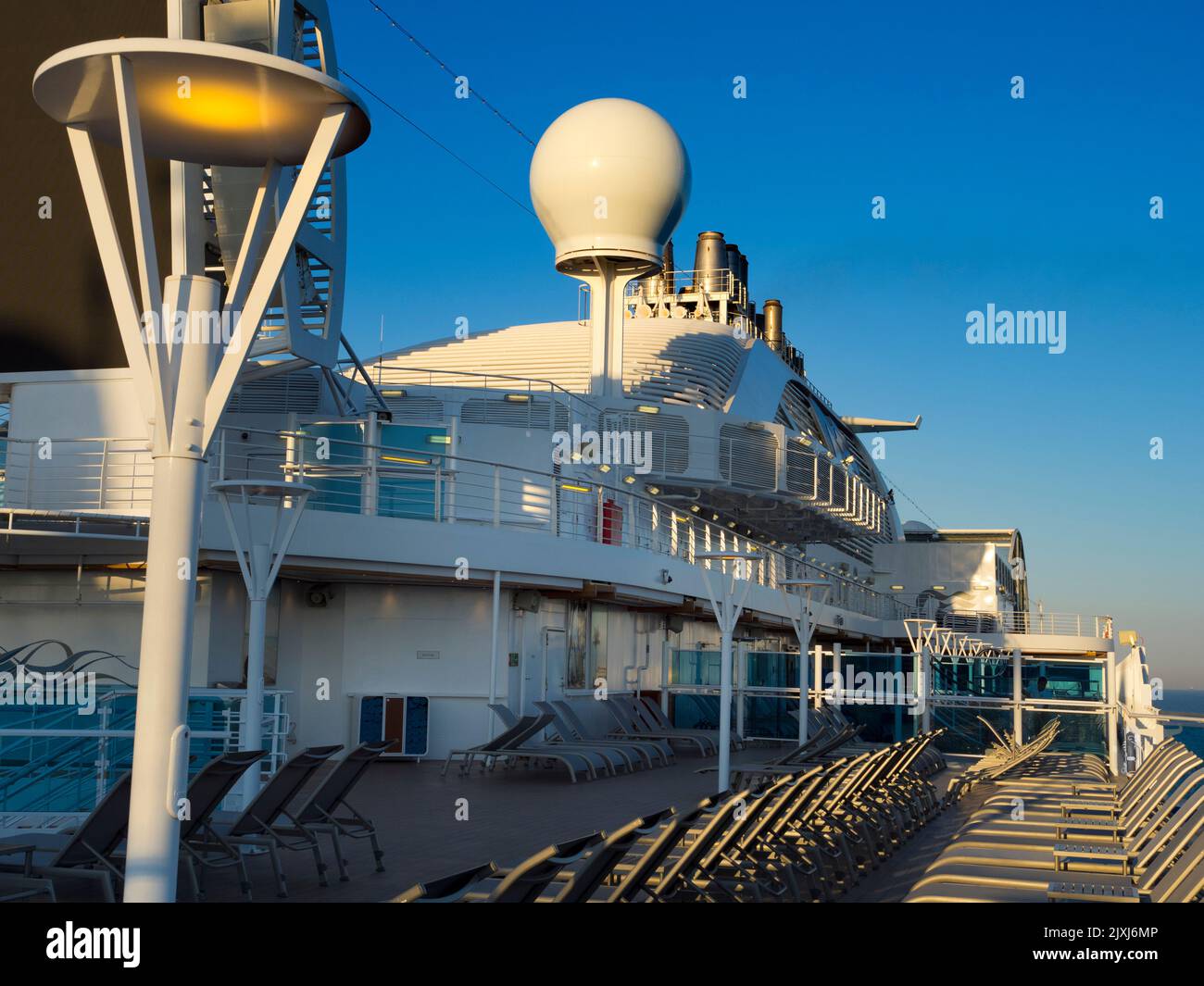 Looking up from the sun deck at the superstructure of a cruise ship in the North Sea, headed towards Rotterdam, the Netherlands Stock Photo