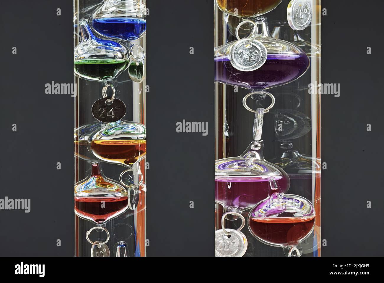 detail of two galileo thermometers of different sizes Stock Photo Alamy
