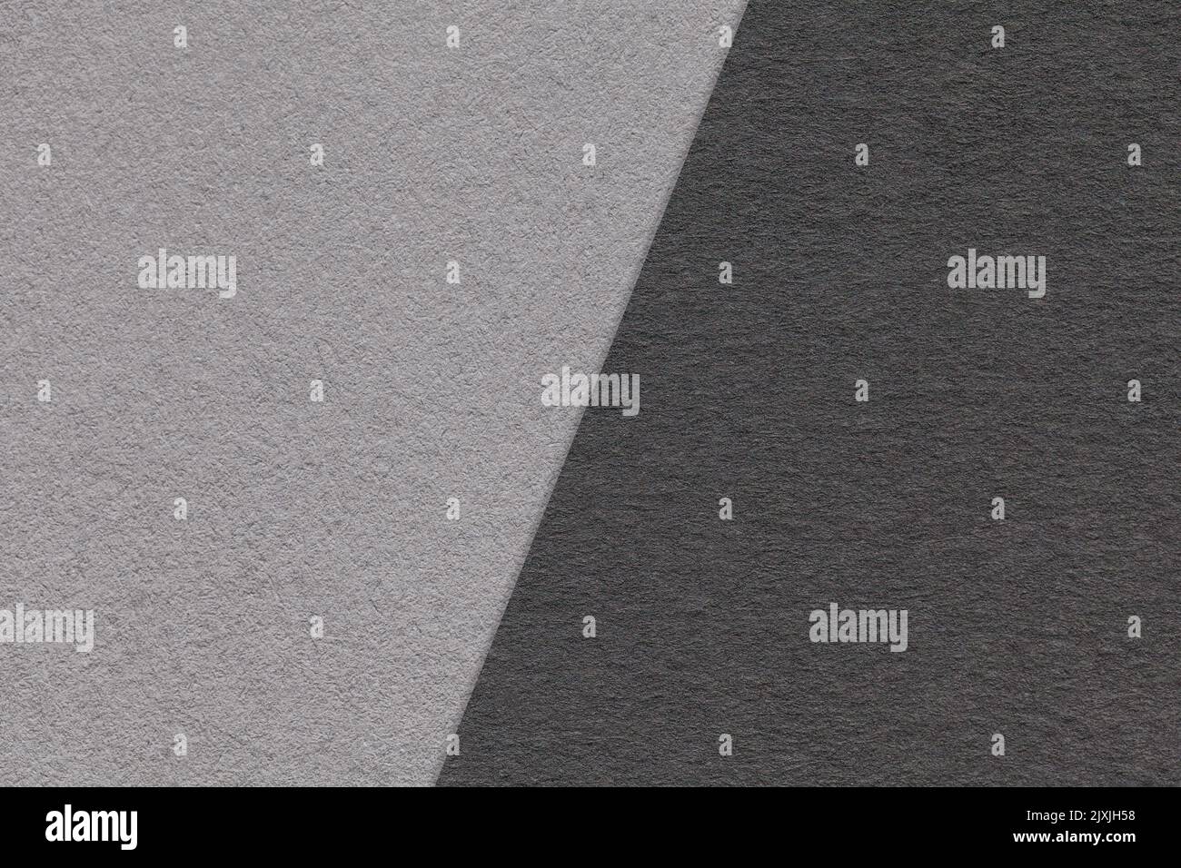 Texture of craft gray and black paper background, half two colors
