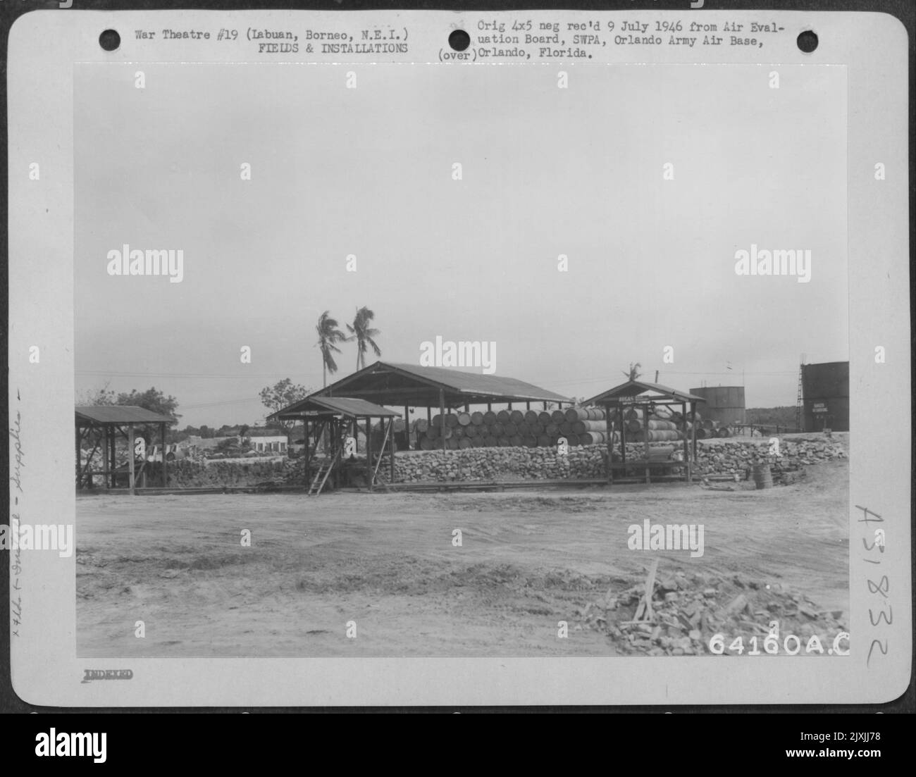 Fuel Depot at Labuan Island, Borneo, N.E.I., 15 July 1945 Stock Photo
