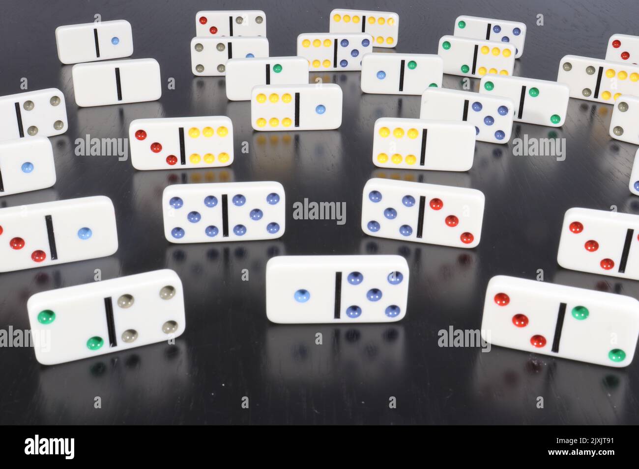 Black Dominoes game block on a colored background Stock Photo - Alamy