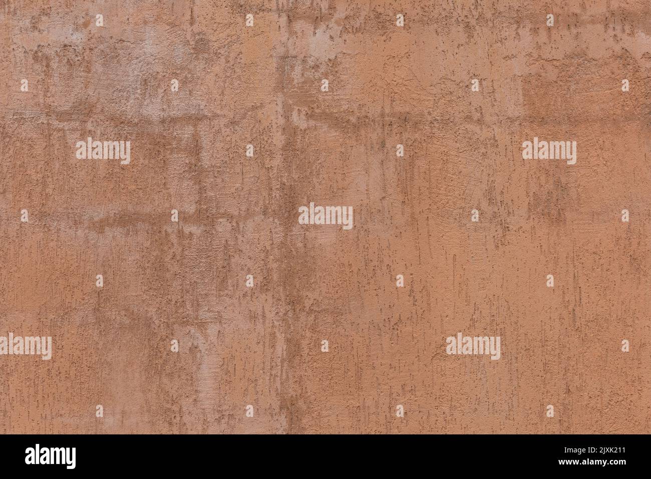 Texture cement wall painted in red. Rough Stock Photo