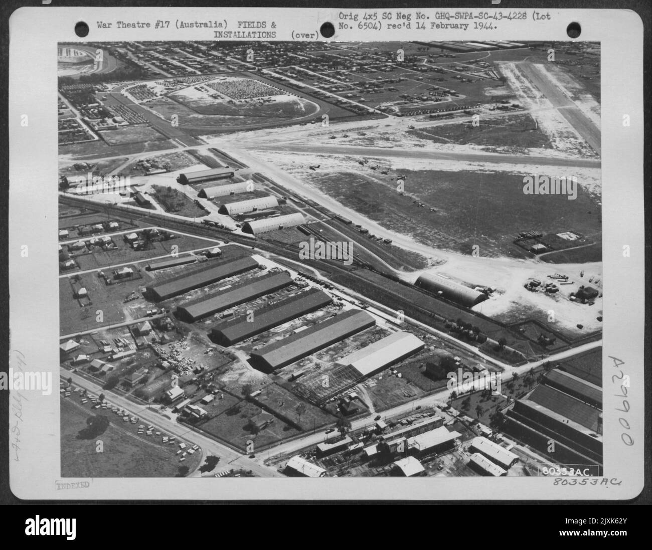 Aerial view of Lattice Truss Warehouses in the foreground with igloo type Air Force warehouses