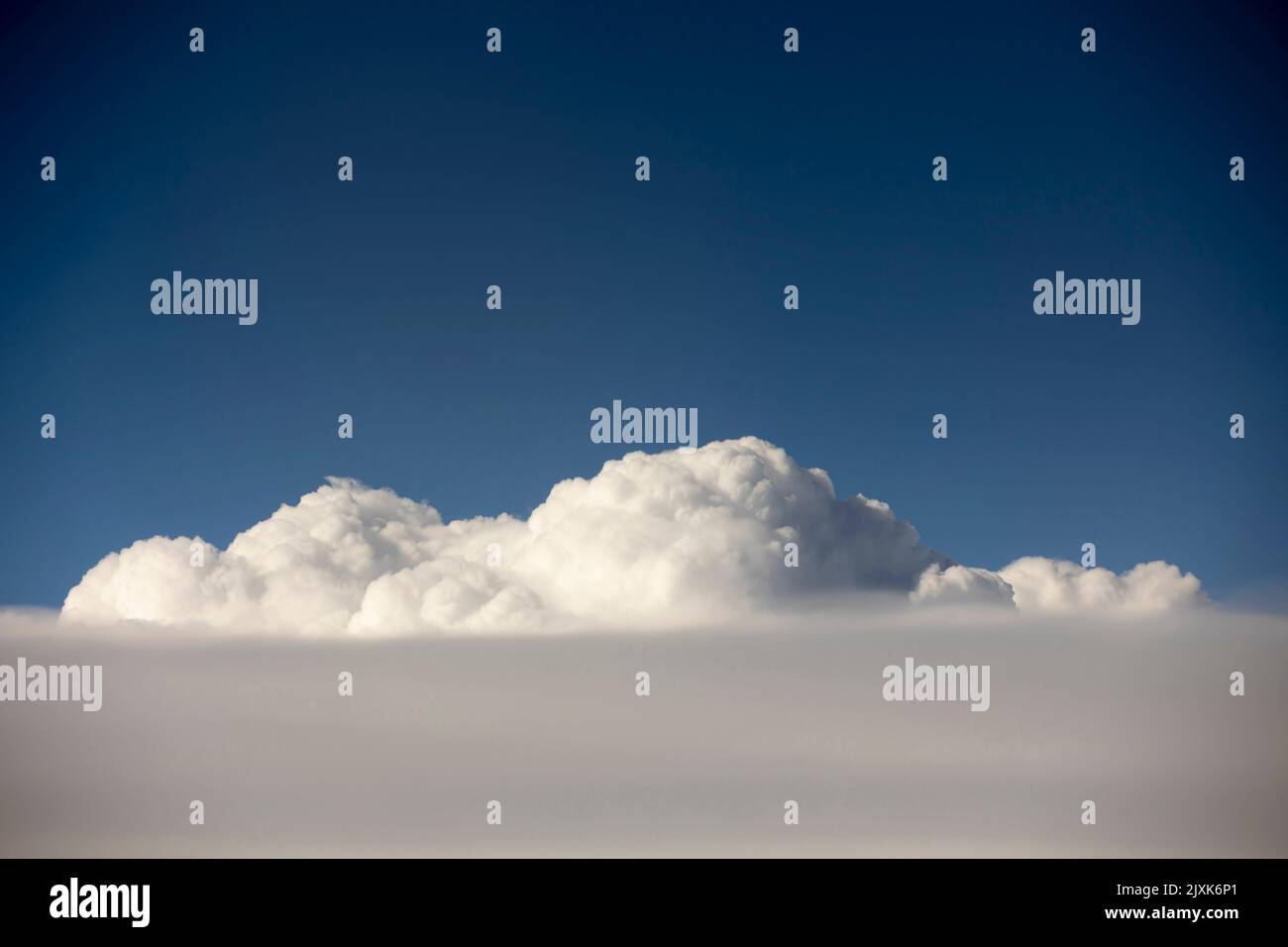 White fluffy cartoon clouds on hi-res stock photography and images - Alamy