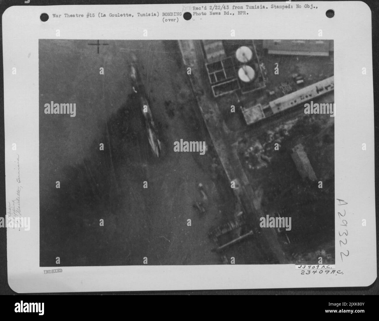 La Goulette, TunisiaA merchant vessel capsized and burning beside the oil depot at La Goulette