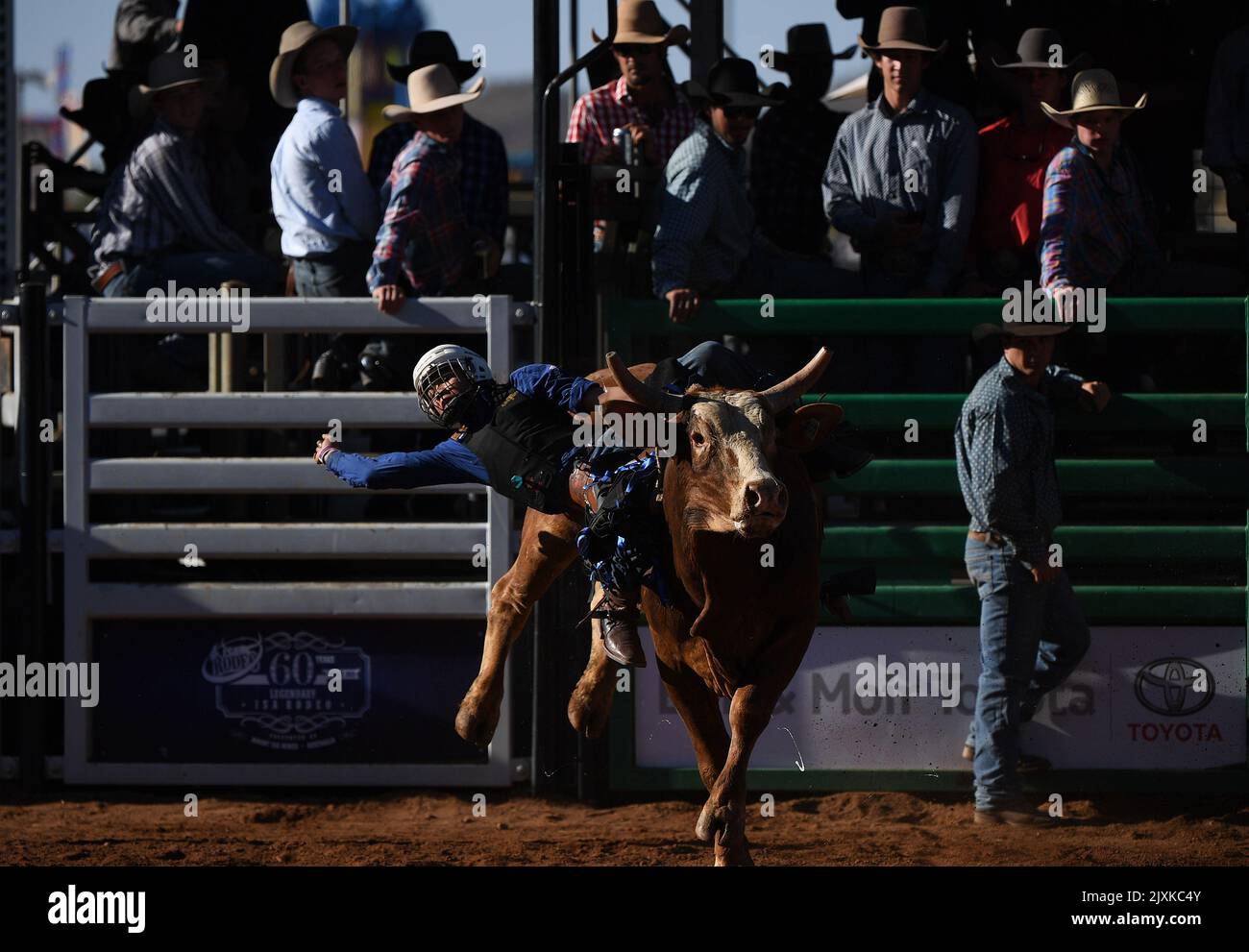 A competitor takes part in the Bull Ride event at the Mount Isa Mines ...