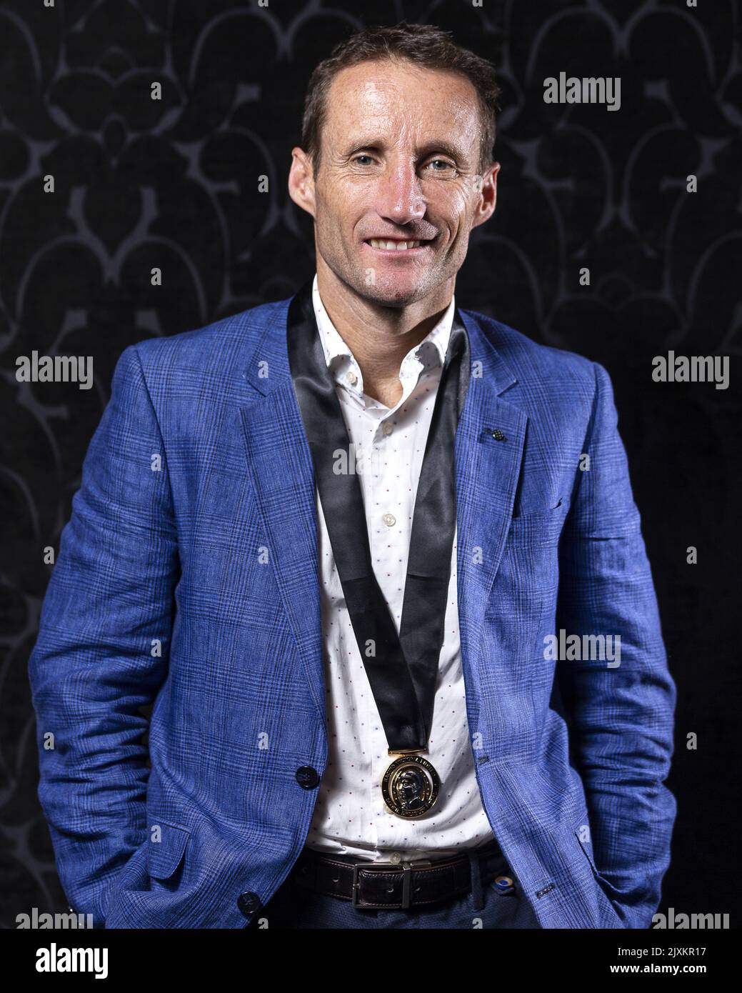 Damien Oliver poses for a photograph with the Scobie Breasley Medal