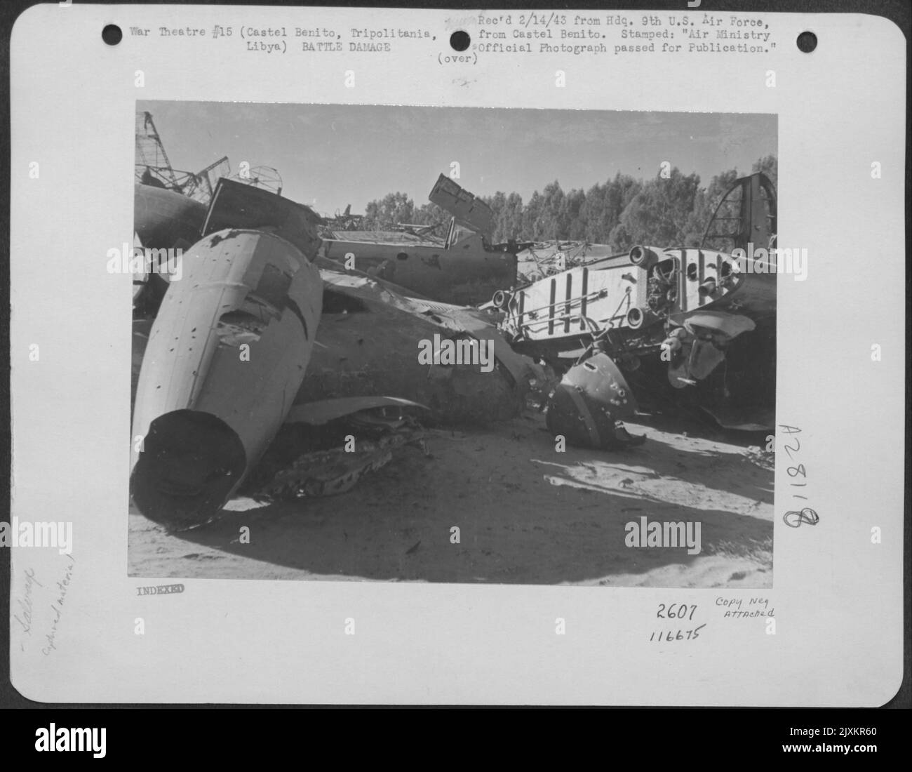 A junk pile of enemy aircraft in a corner of Castel Benito Airfield, near Tripoli, Tripolitania, Libya. Stock Photo