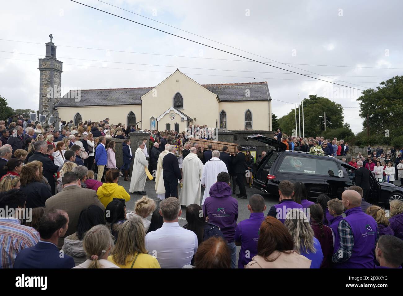 The coffin of Jack de Bromhead leaves The Church of the Nativity of the