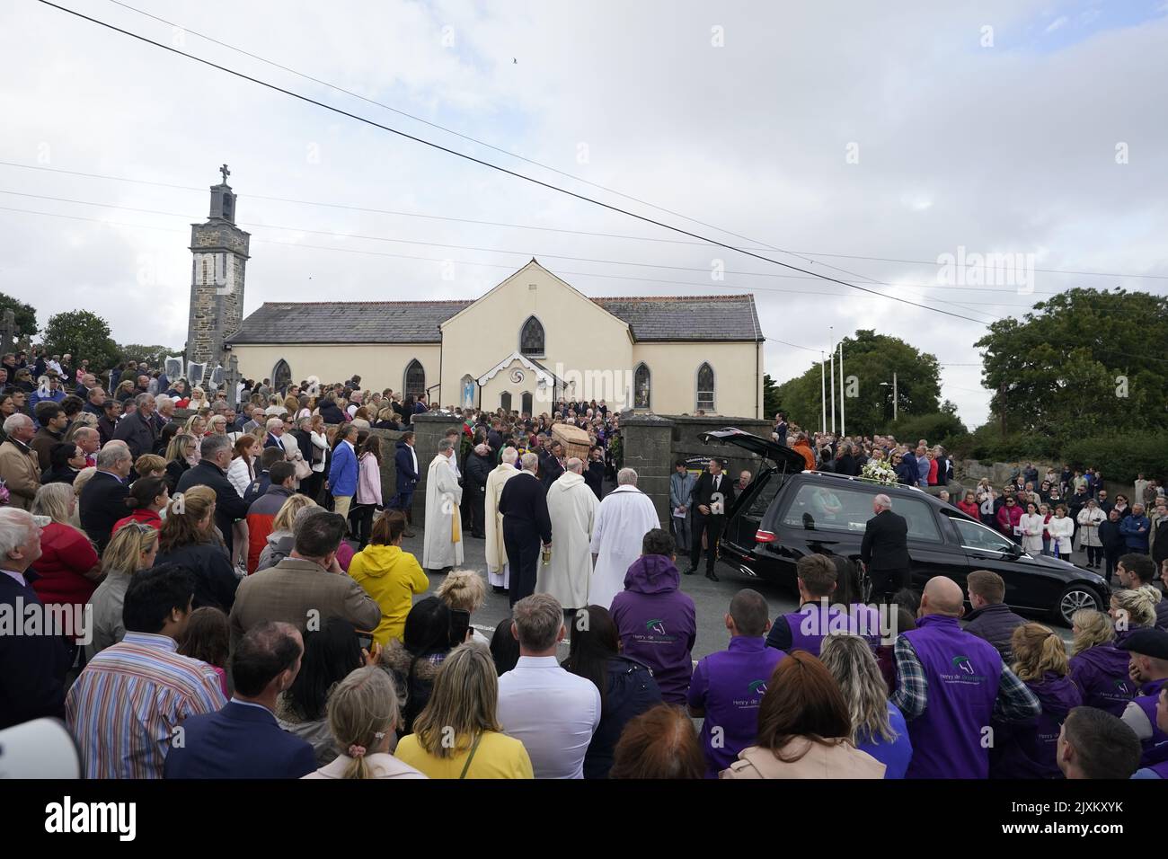 The coffin of Jack de Bromhead leaves The Church of the Nativity of the
