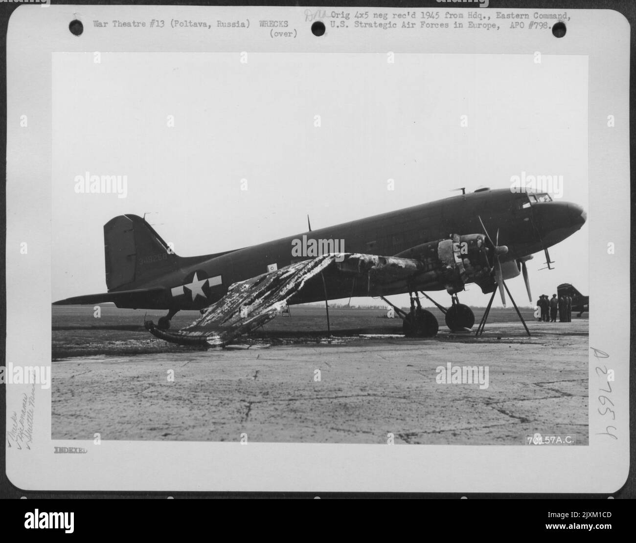 The wing of the Douglas C-47 'LADY HELEN' was damaged by fire when the wing was being washed down with gasoline on 30 April 1945 at Poltava, Airbase, a shuttle mission base in Russia. Stock Photo