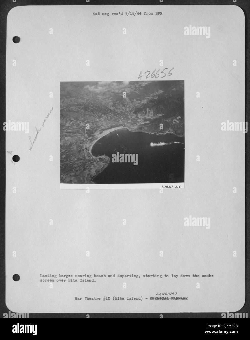 Landing barges nearing beach and departing, starting to lay down the