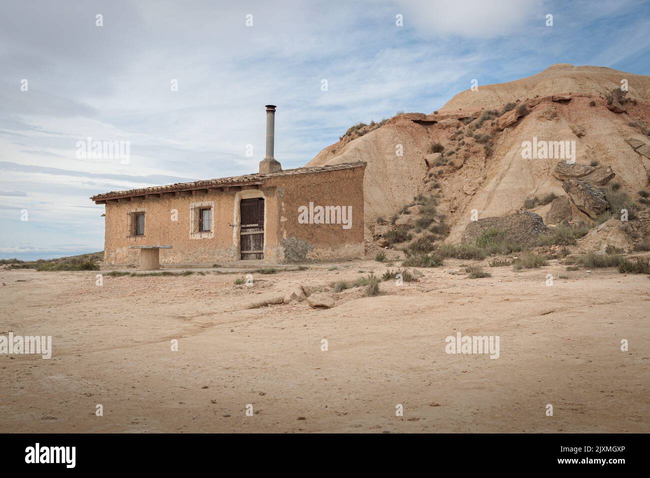 Cabin (lodge, small house) in Badlans of Navarre (Bardenas Reales de Navarra) dessert in the middle of Spain. Stock Photo