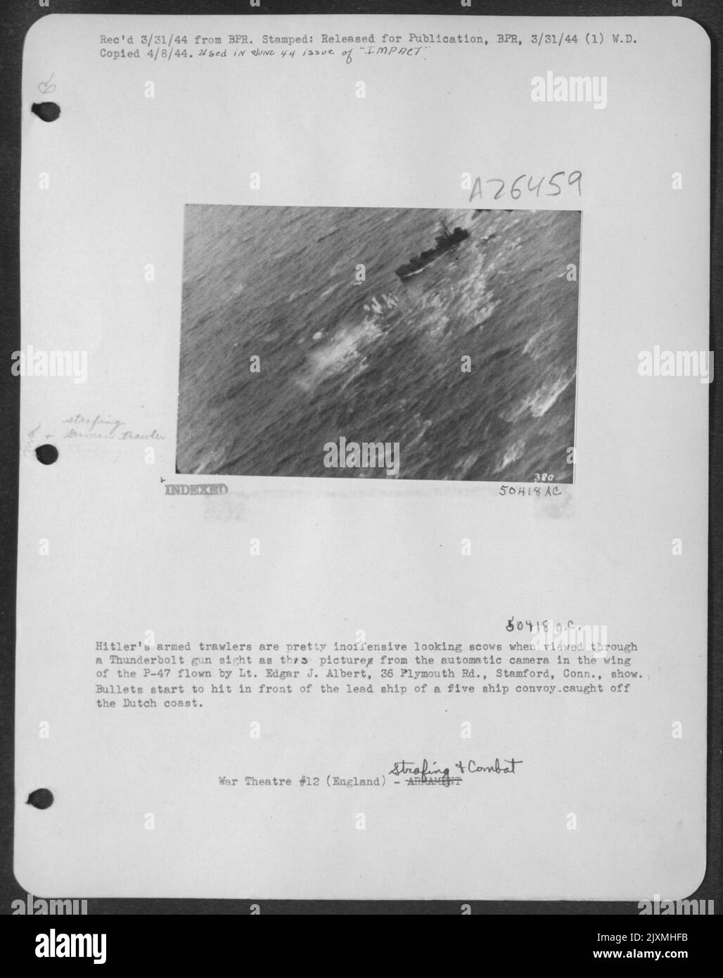 Hitler's armed trawlers are pretty inoffensive looking scows when viewed through a Thunderbolt gun sight as this picture from the automatic camera in the wing of the P-47 flown by Lt. Edgar J. Albert, 36 Plymouth Rd., Stamford, Conn., show. Bullets Stock Photo