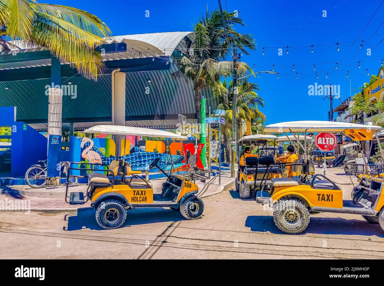 Holbox Mexico 16. May 2022 Buggy car taxi golf cart cars carts at pier
