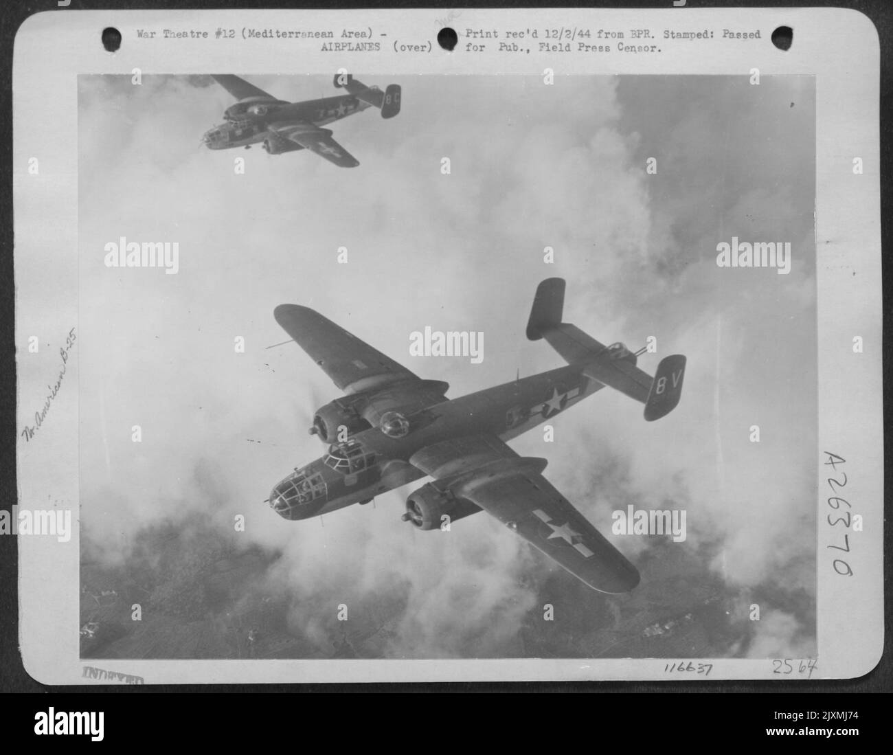 It takes bad weather to keep North American B-25 Mitchells of Tactical Air Force on the ground. Since the first of the year, the Billy Mitchells have bombed more than one thousand targets in the Mediterranean Theatre and flown over 59,999 combat Stock Photo