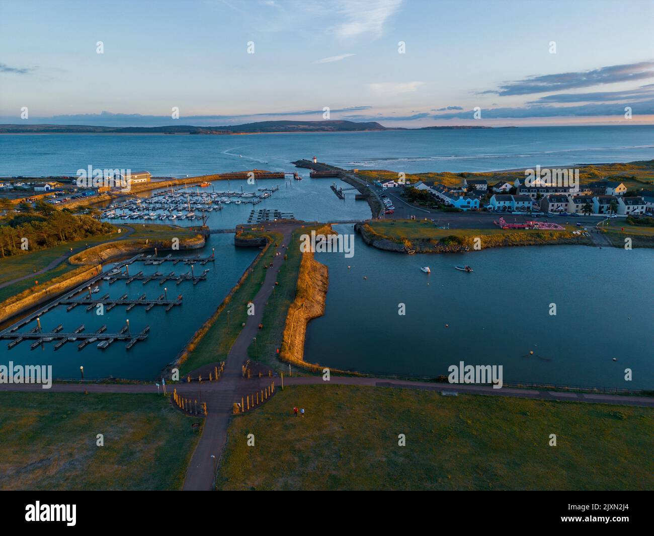 An aerial view of Burry Port coastal fishing town, including lighthouse